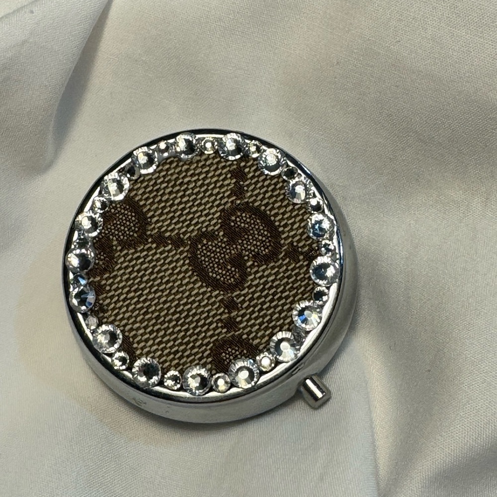 Repurposed Gucci bag made into a pill/earring case with crystal rhinestones.